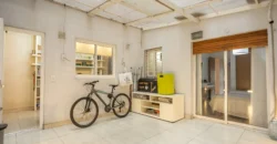 Departamento de 4 ambientes con dependencia y cochera en Caballito